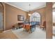 Elegant dining room with a drop leaf table and chair set at 2995 Bravura Lake Dr, Sarasota, FL 34240