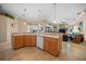 Eat-in kitchen with island seating and views to the Gathering room at 2995 Bravura Lake Dr, Sarasota, FL 34240