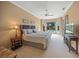 Large main bedroom with stunning pool views at 2995 Bravura Lake Dr, Sarasota, FL 34240