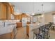 Bright kitchen featuring wood cabinets, and stainless steel appliances at 2995 Bravura Lake Dr, Sarasota, FL 34240