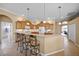 Spacious kitchen with an island, breakfast bar, and ample cabinetry at 2995 Bravura Lake Dr, Sarasota, FL 34240