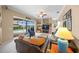 Spacious living area with sliding doors leading to the pool area at 2995 Bravura Lake Dr, Sarasota, FL 34240