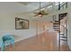 Open living area with loft and spiral staircase at 1026 Bird Bay Way # 276, Venice, FL 34285