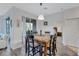 Dining area with granite-top table and four chairs, near kitchen at 9019 Heritage Sound Dr, Bradenton, FL 34212