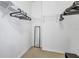 Walk-in closet with ample shelving and hanging space at 9019 Heritage Sound Dr, Bradenton, FL 34212