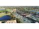 Aerial view of community amenities including tennis courts and clubhouse at 9019 Heritage Sound Dr, Bradenton, FL 34212