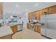 Modern kitchen boasting stainless steel appliances and a large island at 9019 Heritage Sound Dr, Bradenton, FL 34212