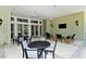 Outdoor patio with seating and flat screen TV at 12420 Destin Loop, Venice, FL 34293