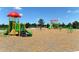 Colorful playground with slides and climbing structures at 12420 Destin Loop, Venice, FL 34293