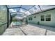 Screened pool and patio with safety fence at 12420 Destin Loop, Venice, FL 34293