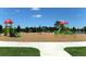 playground with various play structures and a soft surface at 12420 Destin Loop, Venice, FL 34293