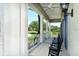 Relaxing covered porch with rocking chairs at 12420 Destin Loop, Venice, FL 34293