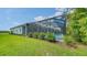 Well-maintained home with lush landscaping and pool at 12420 Destin Loop, Venice, FL 34293