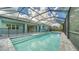 Inviting pool and screened patio with spacious deck at 12420 Destin Loop, Venice, FL 34293