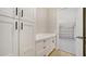 Garage entry with built-in cabinets and a spacious feel at 12420 Destin Loop, Venice, FL 34293