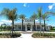 Grand Palm community clubhouse with palm trees at 12420 Destin Loop, Venice, FL 34293