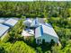 Aerial view showcasing the home's unique design and private backyard at 8175 Dittmar St, Port Charlotte, FL 33981