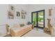 Light and airy bedroom with a daybed and access to backyard at 8175 Dittmar St, Port Charlotte, FL 33981