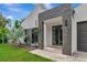 Contemporary entryway with gray stone and double doors at 8175 Dittmar St, Port Charlotte, FL 33981