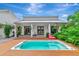 Relax in your own backyard oasis complete with a refreshing pool and spa at 8175 Dittmar St, Port Charlotte, FL 33981