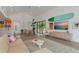 Open concept living room with a modern aesthetic at 8175 Dittmar St, Port Charlotte, FL 33981