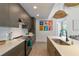 Modern kitchen with island and stylish light fixtures at 8175 Dittmar St, Port Charlotte, FL 33981