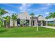 Modern home with two-car garage and attractive landscaping at 8175 Dittmar St, Port Charlotte, FL 33981