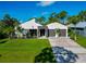 Modern home with two-car garage and clean lines at 8175 Dittmar St, Port Charlotte, FL 33981