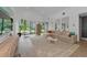 Bright living room with large windows and comfortable seating at 8175 Dittmar St, Port Charlotte, FL 33981