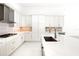 Spacious kitchen featuring white cabinets and a large island at 4612 Mondrian Ct, Sarasota, FL 34240