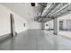 Bright and spacious garage interior with epoxy flooring at 4612 Mondrian Ct, Sarasota, FL 34240