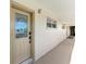 Light beige door with glass accents at 512 W Venice Ave # 403, Venice, FL 34285