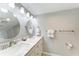 Bathroom features double vanity with marble countertop at 512 W Venice Ave # 403, Venice, FL 34285