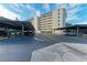 Exterior view of building and parking garage at 512 W Venice Ave # 403, Venice, FL 34285