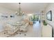 Bright dining area with wicker chairs at 512 W Venice Ave # 403, Venice, FL 34285