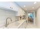 Clean kitchen with white cabinetry and updated appliances at 512 W Venice Ave # 403, Venice, FL 34285