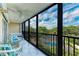Spacious screened lanai overlooking lush landscape at 512 W Venice Ave # 403, Venice, FL 34285