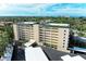 Aerial view of a building showcasing its exterior and parking at 512 W Venice Ave # 403, Venice, FL 34285