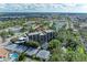 Aerial view of residential building near tennis courts and park at 512 W Venice Ave # 403, Venice, FL 34285