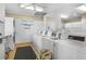 Shared laundry room with multiple washers and dryers at 1522 Pleasant Rd # G23, Bradenton, FL 34207