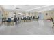 Community room with tables and chairs for gatherings at 1522 Pleasant Rd # G23, Bradenton, FL 34207