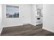 Open concept living room and kitchen with gray vinyl plank flooring at 1522 Pleasant Rd # G23, Bradenton, FL 34207