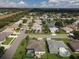 Wide aerial view of neighborhood with lake at 5747 29Th E St, Bradenton, FL 34203