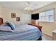 Spacious bedroom with a comfortable bed and built in closet at 5747 29Th E St, Bradenton, FL 34203