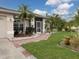 Inviting front entrance with teal double doors and a stone walkway at 5747 29Th E St, Bradenton, FL 34203