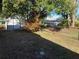 Backyard with storage shed and chain link fence at 607 Bradenton Rd, Venice, FL 34293