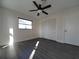 Bright bedroom with vinyl flooring and a large window at 607 Bradenton Rd, Venice, FL 34293