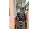 Walk-in closet featuring ample shelving and hanging space at 7818 33Rd E St, Sarasota, FL 34243