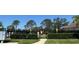 Fenced-in community playground with slide and play structure at 7818 33Rd E St, Sarasota, FL 34243