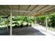 Covered patio, brick pavers, and lush landscaping at 823 32Nd E Ave, Bradenton, FL 34208